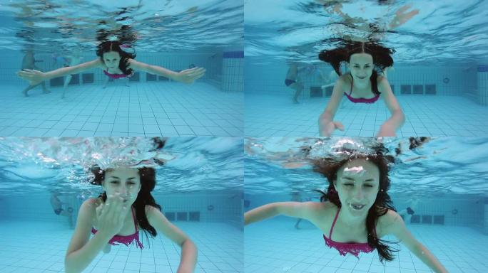 年轻女子在水下挥手