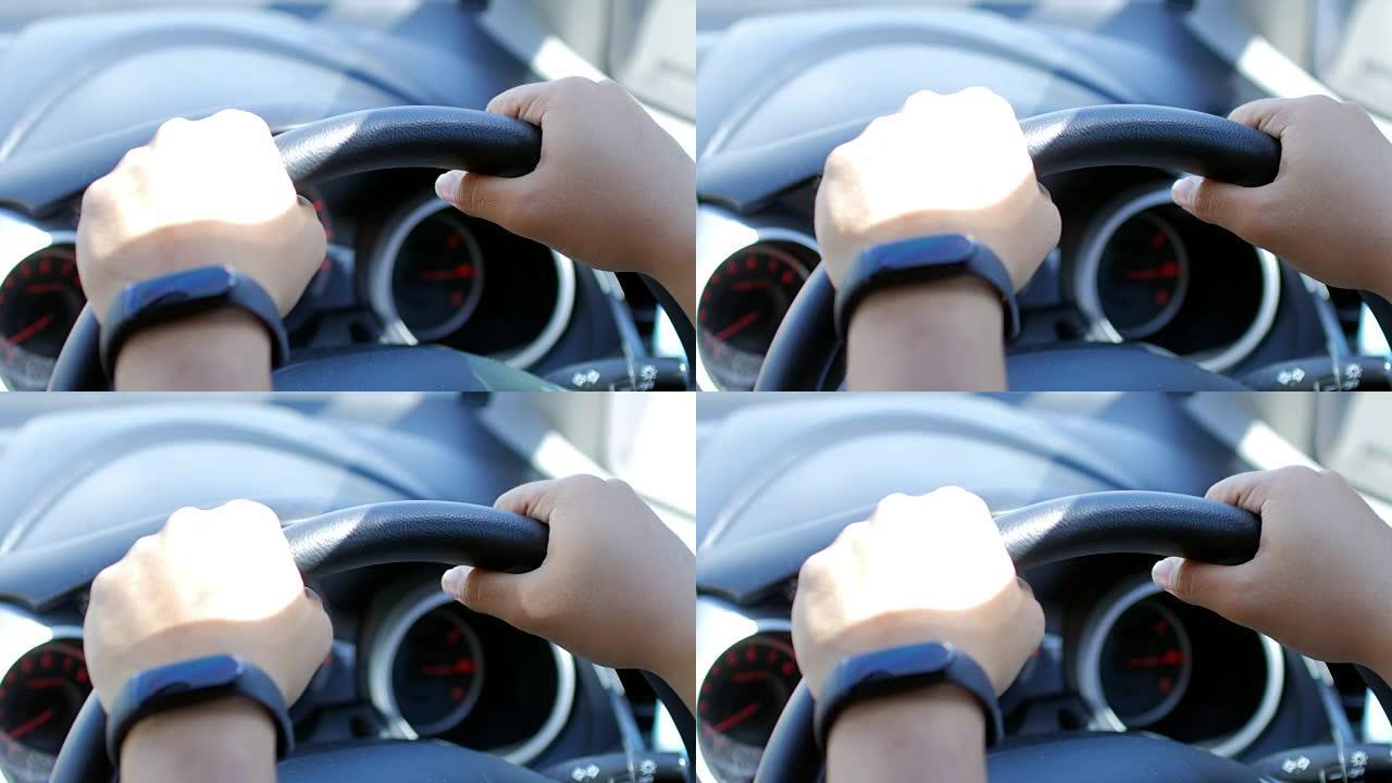 Human Hands drive a car
