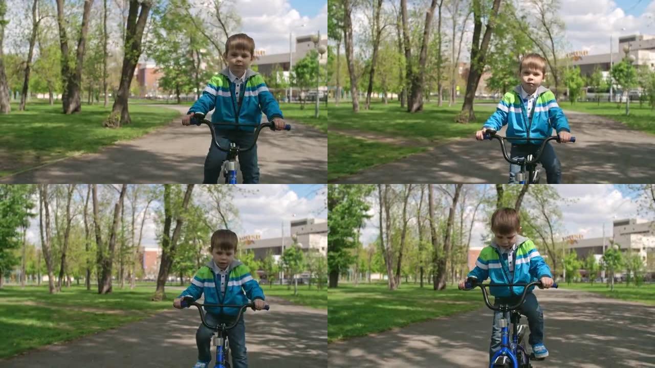 学龄前儿童骑自行车穿过公园