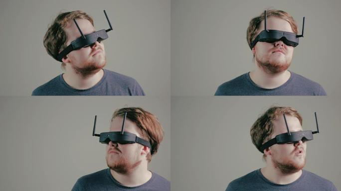 使用虚拟现实眼镜的男人