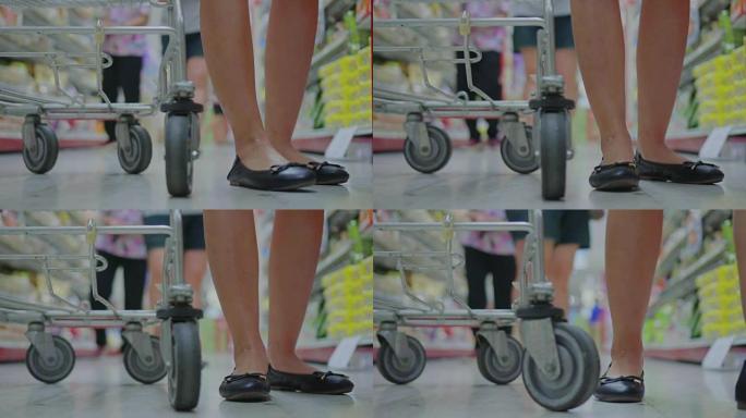 低视角，在超市购物的女性，慢动作