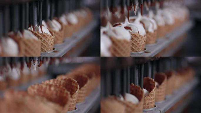机器用冰淇淋填充冰淇淋蛋筒的特写镜头。高清。