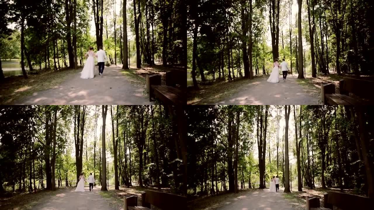 一对幸福的夫妇在婚礼当天牵着手走在公园的河岸上。漂亮的白色服装