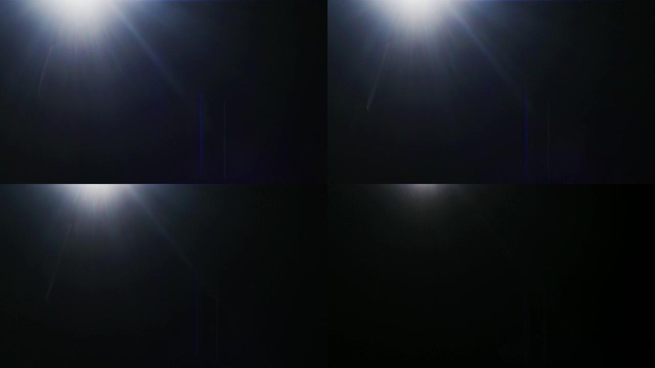 黑色背景上的水平移动光。具有变形效应的真实透镜耀斑。FX特效。易于在混合/覆盖模式下使用。