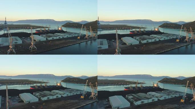 克罗地亚工业码头的WS无人机视点起重机、建筑物和集装箱船