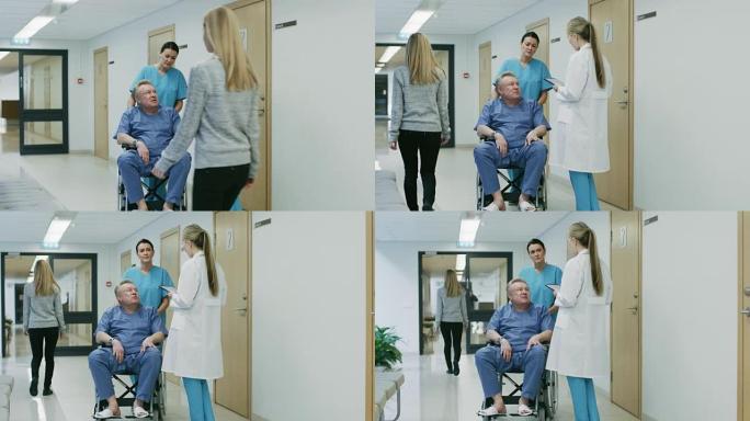 在医院走廊上，护士推着老人坐在轮椅上，医生与他们交谈。干净，新医院有专业的医务人员。