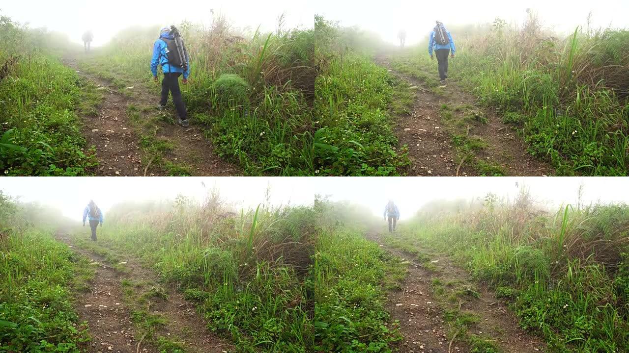 亚洲旅行者男性徒步旅行者在泰国深雨林徒步旅行的4k镜头。旅行和徒步旅行概念