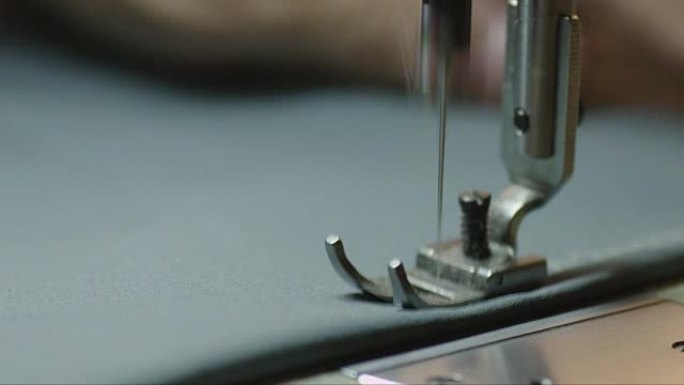 缝纫机针在活动的特写镜头。