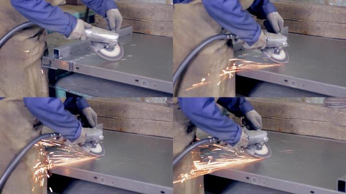 在金属加工厂使用用金属操作的工业磨床的工人