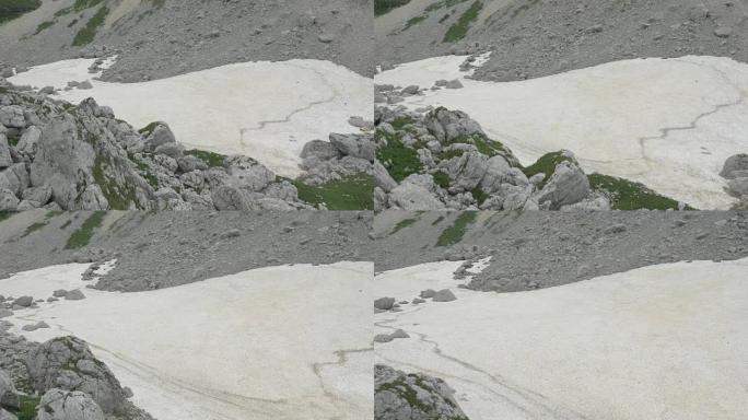 空中: 落基山脉夏季积雪残存的碎石场