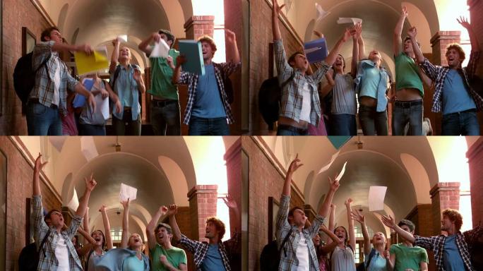 快乐的学生在走廊上跳跃