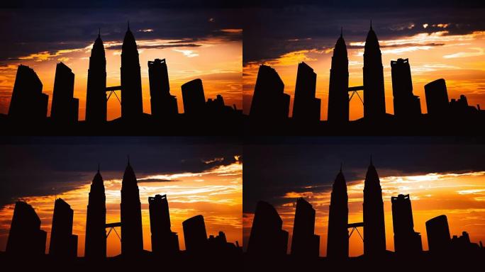 马来西亚日落时吉隆坡城市景观剪影的延时