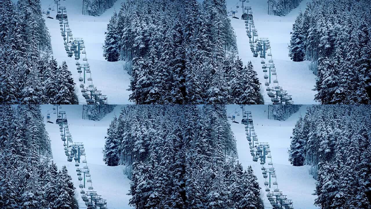 升降椅在雪地里的树木附近上山