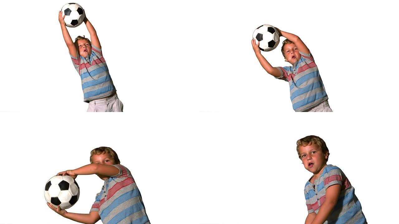男孩在白色背景上踢足球