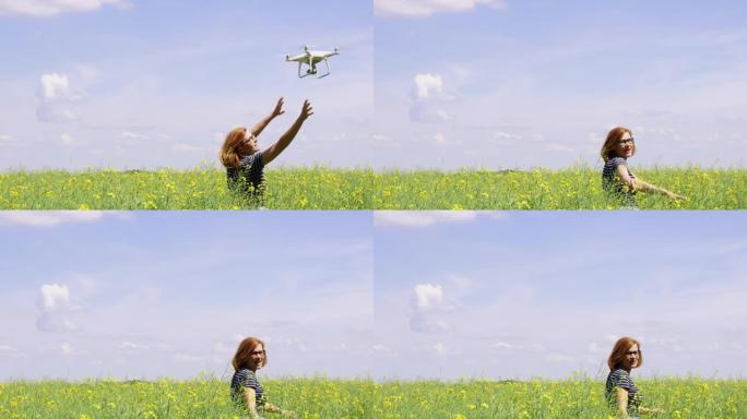 LS女人和一架无人机在田野中间