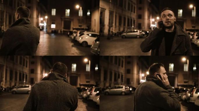 年轻英俊的男人晚上走在街上，使用智能手机，与朋友聊天