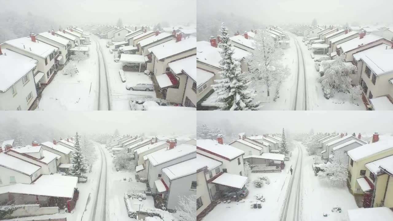 空中: 冬天下雪的郊区小镇