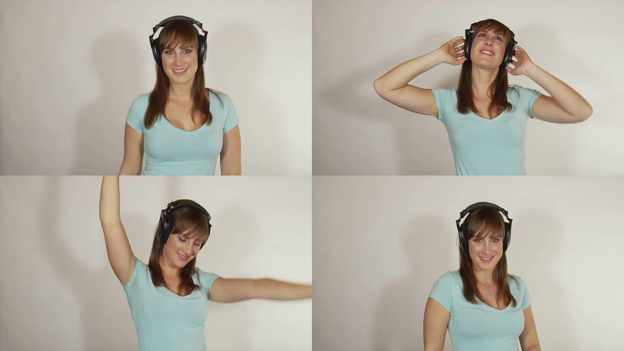 慢动作: 活泼的女人戴着耳机随着跳动的音乐跳舞