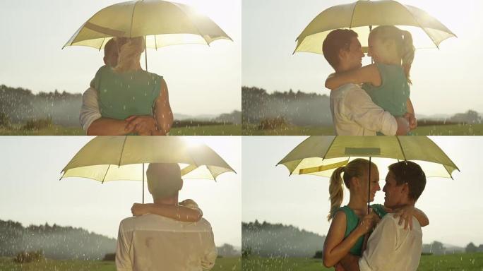 镜头耀斑: 浪漫约会的年轻男女在黄色雨伞下旋转。