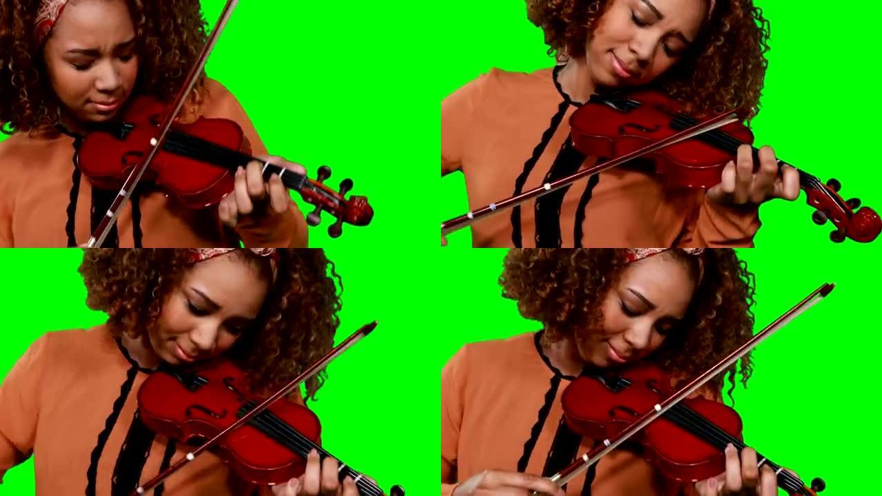 女音乐家拉小提琴的特写