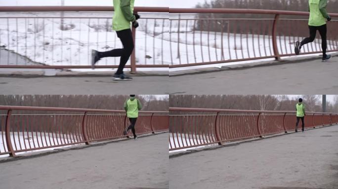 男子在桥上练习冬季慢跑