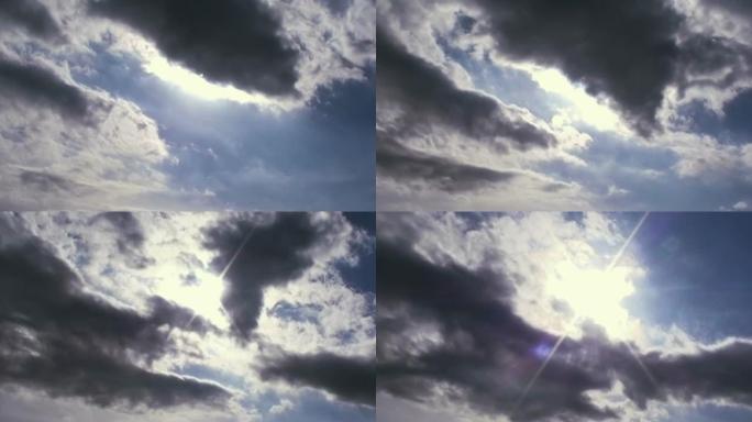 太阳从乌云中升起：戏剧性的天空