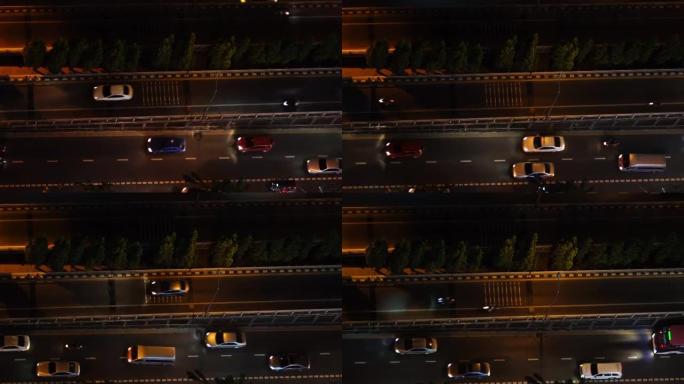 从顶视图看道路上的4k交通镜头，从汽车上看夜间bokeh