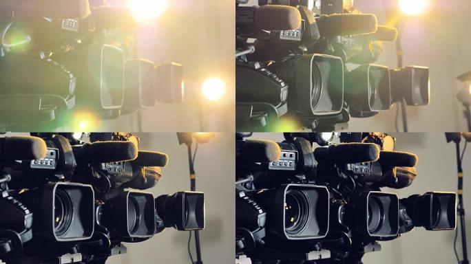 几台不同的摄像机聚焦在明亮的暖光下。