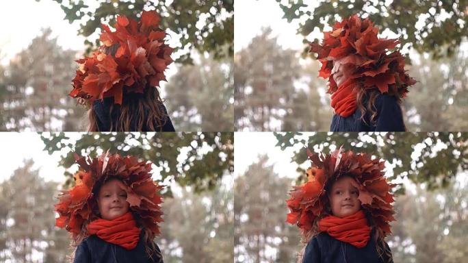 秋天枫叶花环皇冠上快乐微笑美丽可爱的小女孩的全高清特写肖像