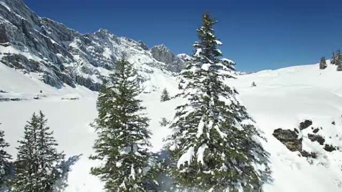 Aerial view of snow covered mountain range with be