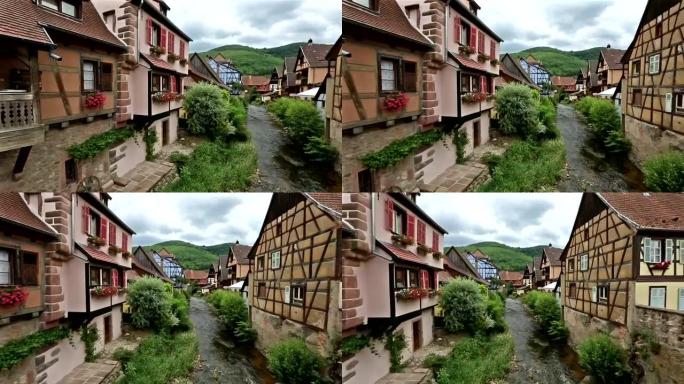 平移镜头: 行人拥挤的Kaysersberg村庄城市景观阿尔萨斯法国