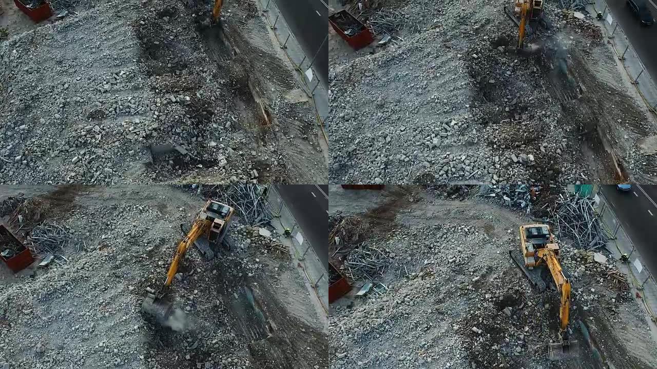 在施工场工作的挖掘机的空中无人机拍摄。