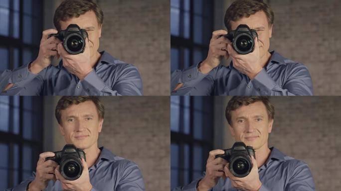 成功摄影师的慢动作肖像用相机拍照。商人系列。