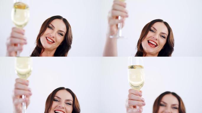 微笑的女人的肖像展示了一杯香槟4k