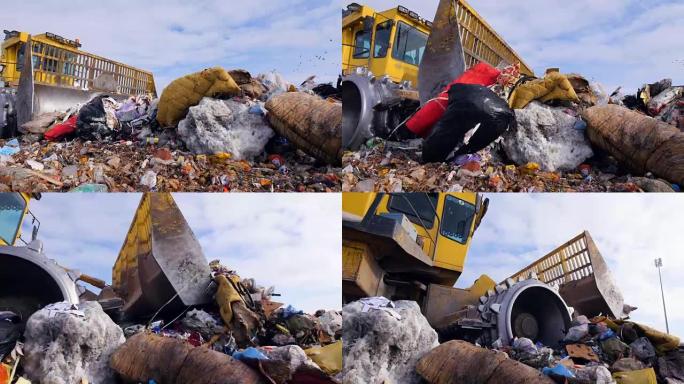 垃圾填埋场卡车在垃圾填埋场运送大大小小的垃圾。