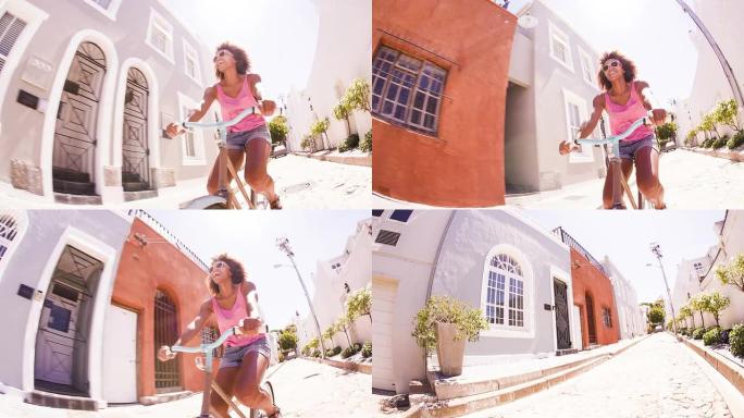 女孩在街上骑自行车