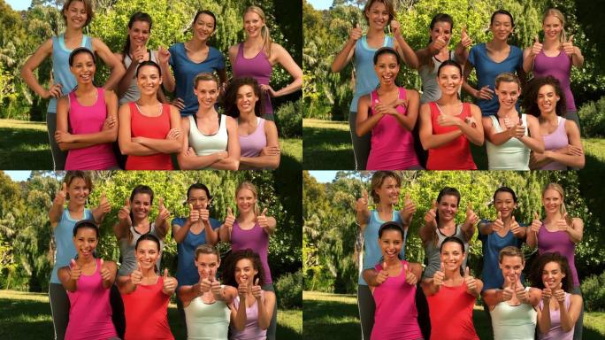 快乐健康的朋友竖起大拇指对着镜头微笑