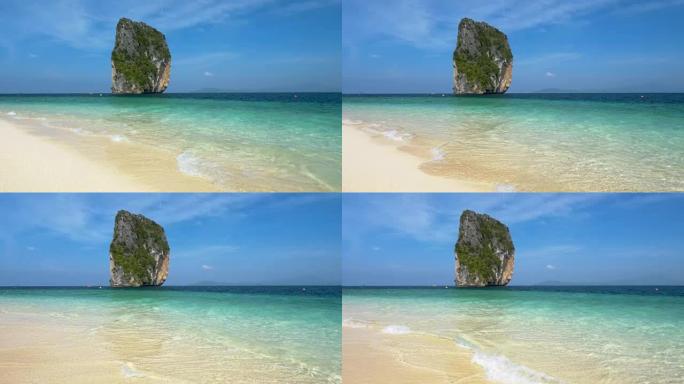 泰国热带岛屿空旷的海滩上清澈碧绿的水。4K, UHD