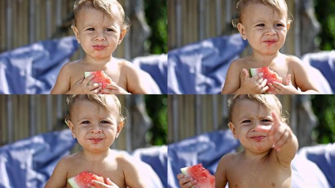 小男孩吃西瓜