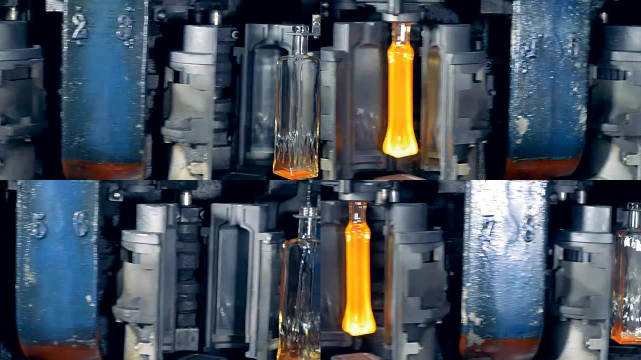 瓶子正在由工厂机器模制和加热