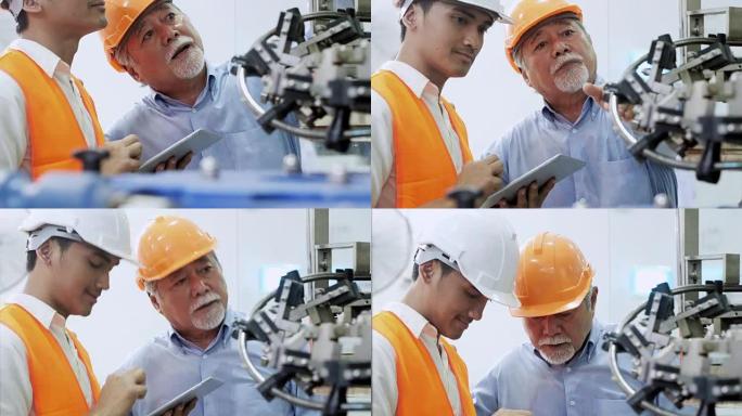 检查工厂运行中的工业的高级人和工人工程师。细心的工人在工厂检查机器