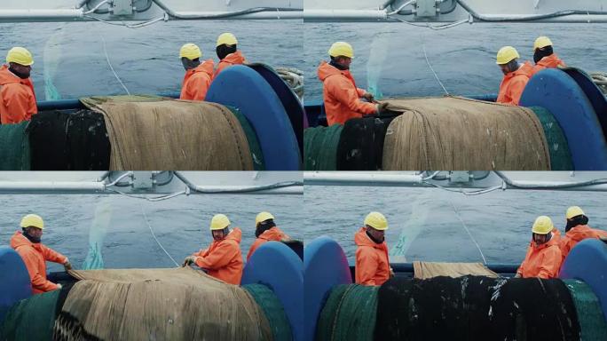 渔民团队在商业捕鱼期间解开拖网