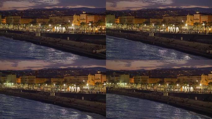 法国尼斯海滩和堤岸的夜景。平移射击4K，UHD