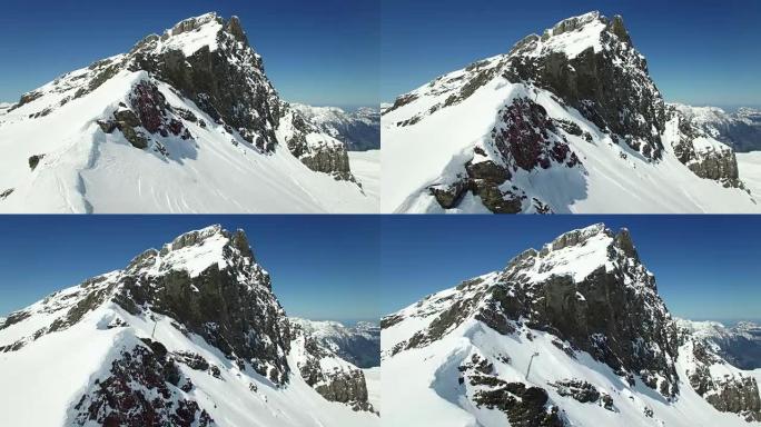Aerial view of snow covered mountain range with be