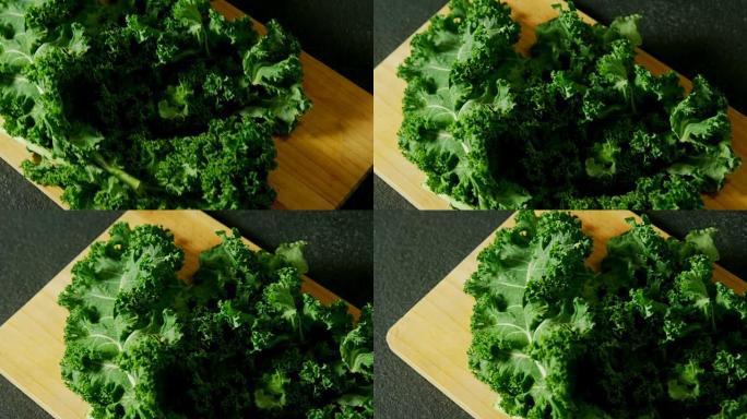 砧板上的绿叶蔬菜4k