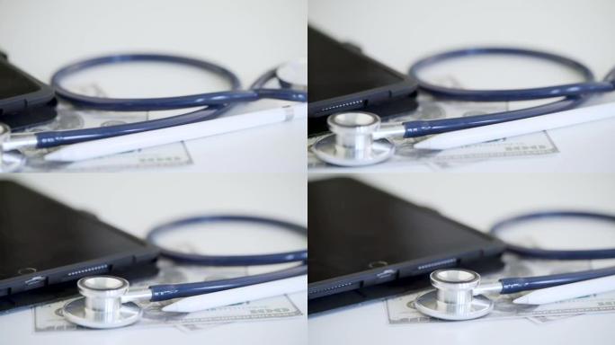 4k footage of Stethoscope with money and medicine 