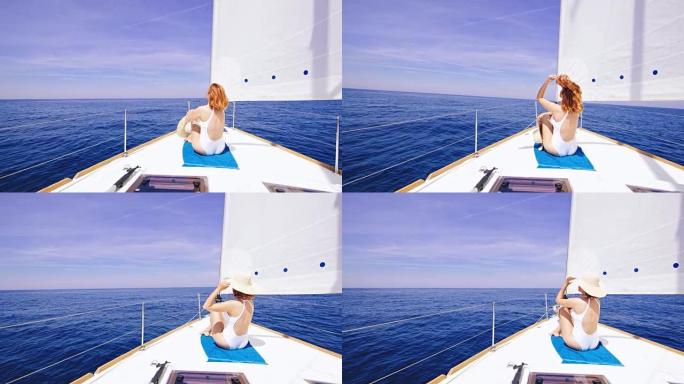 在帆船甲板上享受海风的DS女人