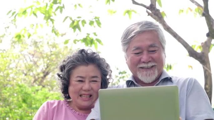 两名老人使用新技术实时视频通话与笔记本电脑通话。