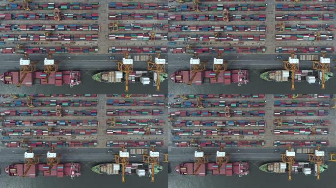 工业港口集装箱船的4k鸟瞰图和缩小图。