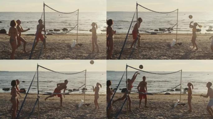 一群年轻人在夕阳下打沙滩排球。慢动作60 FPS。